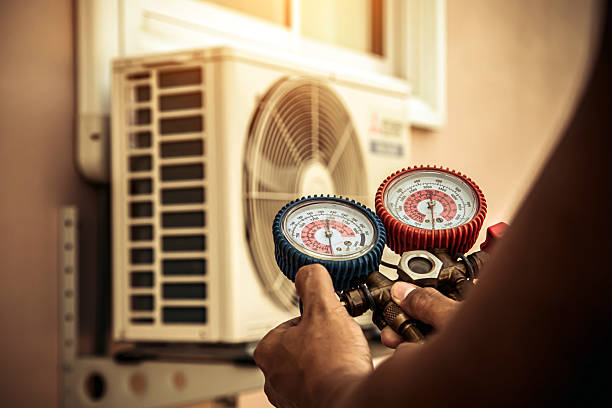Professional Ductwork Repair technician working in Cumming, GA